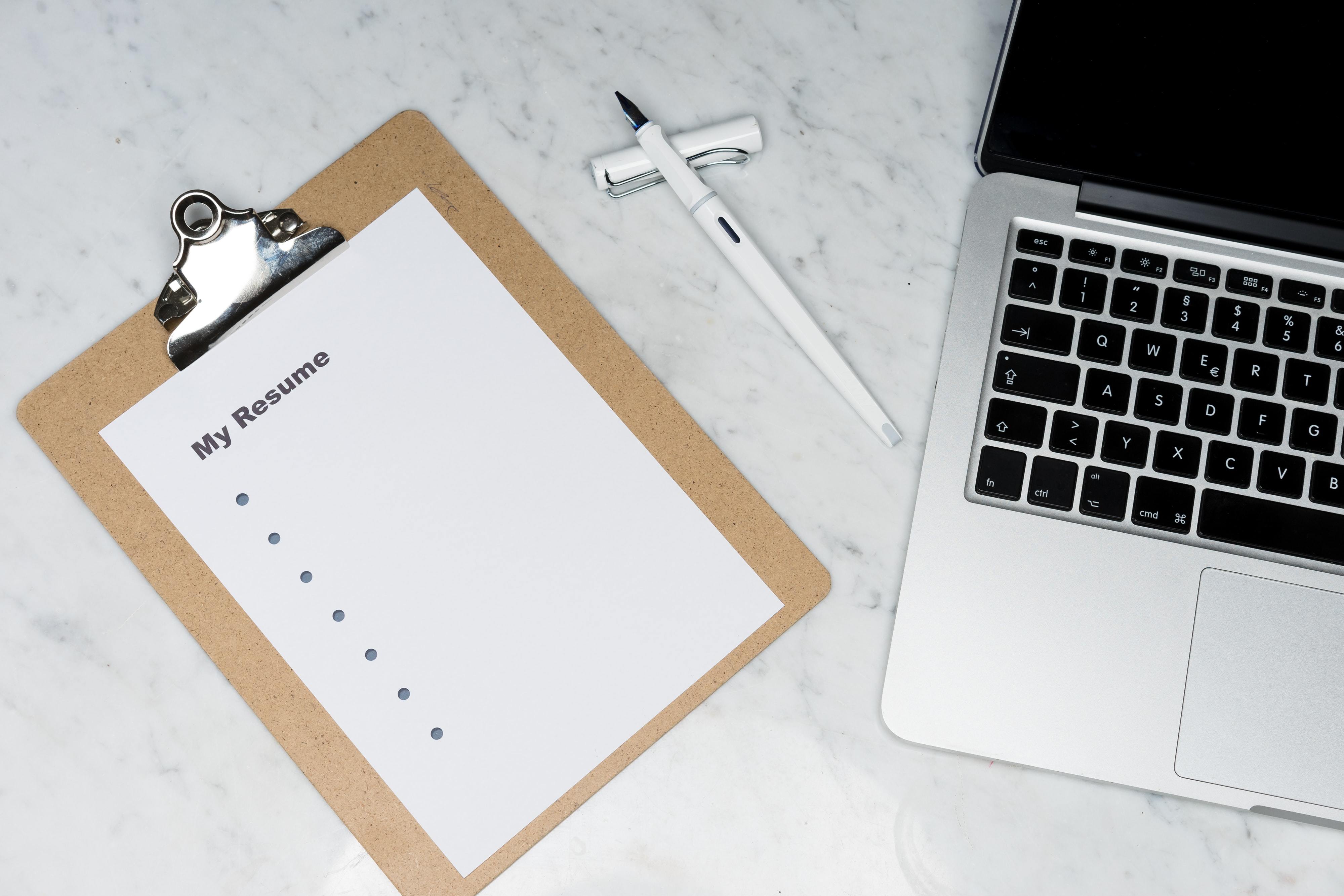 resume-checklist-next-to-laptop.jpg